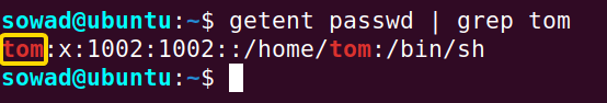 Checking whether the new user "tom" exists in the system.